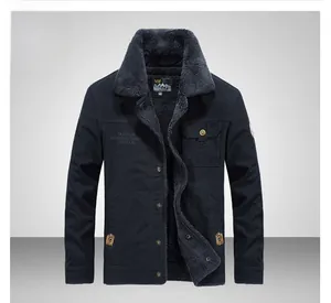 Detail of navy blue winter jacket with warm grey fleece lining and chest embroidery