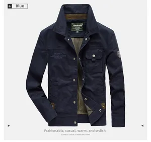 Detail of dark blue outdoor jacket collar with brown contrast and button closure