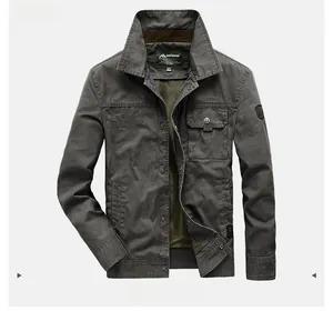 Close-up of military green outdoor jacket featuring stand collar and chest embroidery