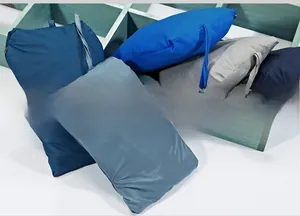 Detail of portable waterproof nylon storage bags in blue and grey for travel outdoor use