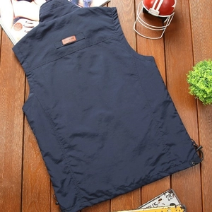 Men's navy outdoor utility vest with leather classic patch and adjustable drawstring hem