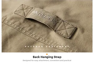 Detail of khaki jacket showing heavy-duty strap and FASHION embroidery on twill fabric