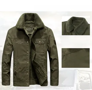 Detail of army green winter jacket featuring detachable fur collar and warm fleece lining