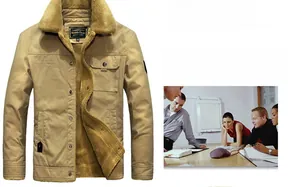 Detail of winter jacket with warm fleece collar and khaki cotton canvas texture