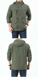 Detail view of men's green fleece parka showing hooded design and functional pockets
