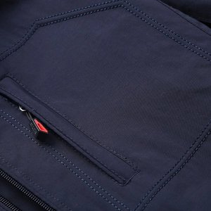 Men's navy waterproof outdoor jacket with durable zipper pockets and reinforced stitching