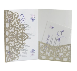 Detailed laser-cut vine patterns on champagne glitter paper wedding invitation set