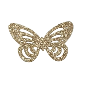 Macro shot of 3D gold glitter hollow butterfly wall sticker for festive party decor