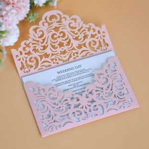 Pink laser cut wedding invitation set with floral hollow pattern and white inner card