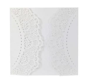 Elegant white laser-cut wedding invitation with intricate lace hollow design on pearl paper