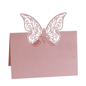 Elegant pearl pink laser-cut butterfly place cards for wedding party table seating