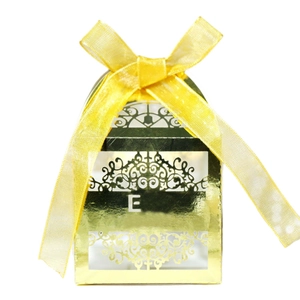 Golden laser cut gift box with ribbon and hollow letter E for wedding and party candy
