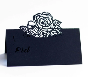 Black laser-cut Eid Mubarak table place card with intricate rose floral patterns