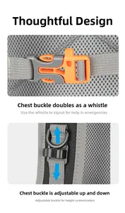 Detail of adjustable chest strap with orange emergency whistle buckle on hiking backpack