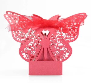 Detailed laser-cut butterfly gift box in red with a matching silk ribbon bow