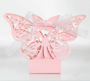 Laser-cut pink butterfly candy box with pearlescent finish and white organza ribbon