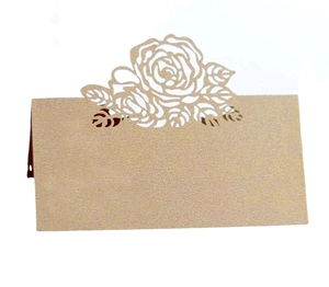 Champagne gold laser cut rose place card for weddings made of elegant pearlescent paper