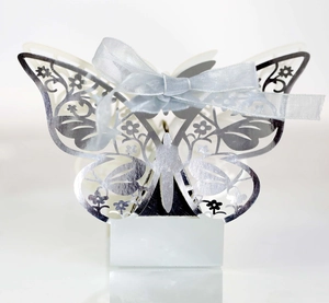 Detailed laser-cut silver butterfly gift box with mirror finish and elegant ribbon bow