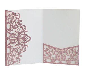 Intricate laser-cut floral details on rose gold glitter wedding invitation card