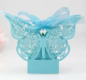 Elegant light blue laser cut butterfly wedding favor box with delicate rose hollow pattern