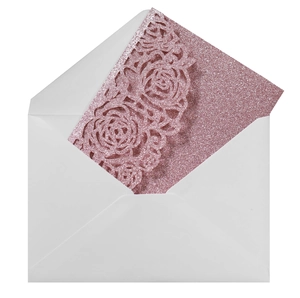 Detail of rose gold glitter laser cut rose wedding card with white envelope set