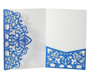 Detail of laser-cut floral pattern on blue glitter pocket for wedding invitations