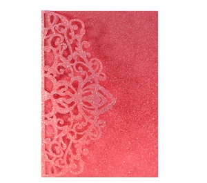 Detailed laser-cut floral pattern on red glitter wedding invitation card cover