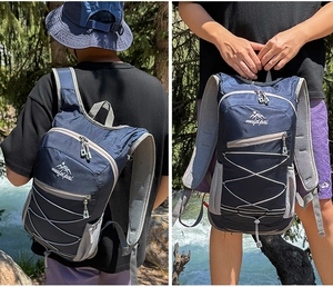 Detail of blue waterproof cycling backpack with mesh straps and bungee system