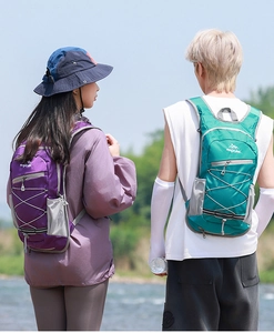 Macro detail of lightweight hiking backpacks with waterproof fabric and bungee system