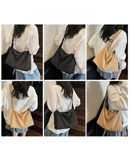 Détails de grands sacs fourre-tout en toile noir et kaki avec bandoulières réglables