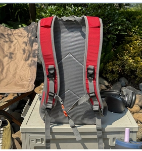 Detail of ergonomic 3D breathable mesh back panel and padded straps on outdoor backpack