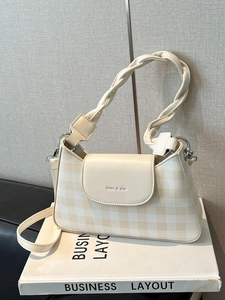 Minimalist beige gingham underarm bag with a woven handle and front flap closure