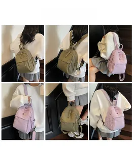 Macro details of nylon backpacks in army green and lilac showing versatile carrying styles