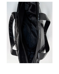 Top view of large black tote bag showing spacious interior and secure zipper closure
