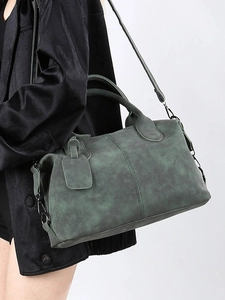 Vintage dark green Boston bag in matte leather with adjustable shoulder straps