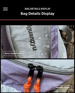 Detail view of water-resistant gray fabric and smooth purple zippers with orange pulls