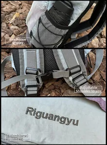 Detail of outdoor backpack featuring side mesh pocket and adjustable chest buckle straps