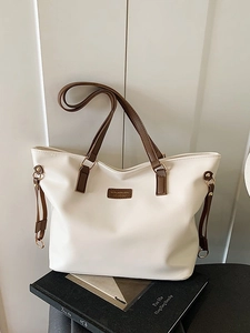 Minimalist white tote bag with brown straps for women, perfect for office and daily commuting