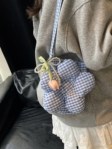 Blue and white checkered flower-shaped crossbody bag with pearl strap and bow detail