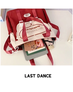 Internal view of a spacious canvas backpack showing tablet, umbrella, and book storage
