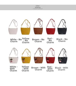 Minimalist square crossbody bags in five colors with optional cherry charm accessory