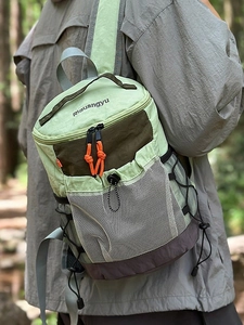 Lightweight outdoor hiking backpack in olive green with multiple pockets and durable straps