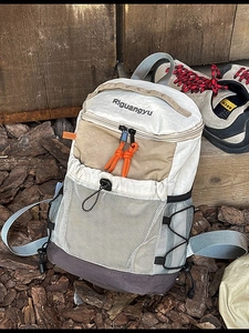 Outdoor lightweight hiking backpack with mesh pocket and functional cord in tricolor design