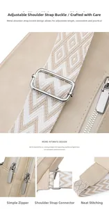Detail of beige leather bag showing adjustable woven strap, metal zipper and fine stitching