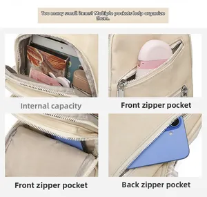 Detail view of multi-pocket storage structure and interior of the beige crossbody bag