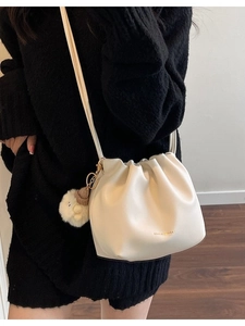Chic pleated cloud bucket bag in cream white PU leather with cute plush chick pendant