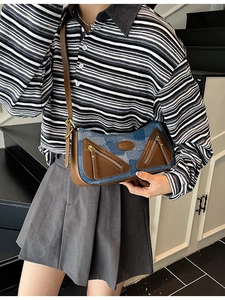 Vintage baguette shoulder bag in blue denim and brown leather with adjustable strap