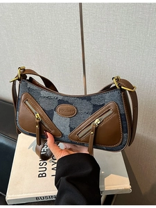 Vintage denim baguette bag with brown leather trim and retro gold hardware for women