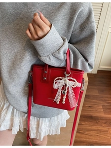 Red small fashion handbag for women with pearl bow charm and shoulder strap
