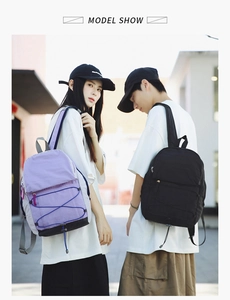 Outdoor backpacks in purple and black with elastic drawstrings and hidden pockets